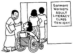 A group of four women, including one woman in a wheelchair, attend the Garment Workers Adult Literacy Class.